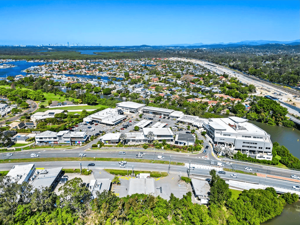 Aerial view of a Gold Coast development beside the motorway