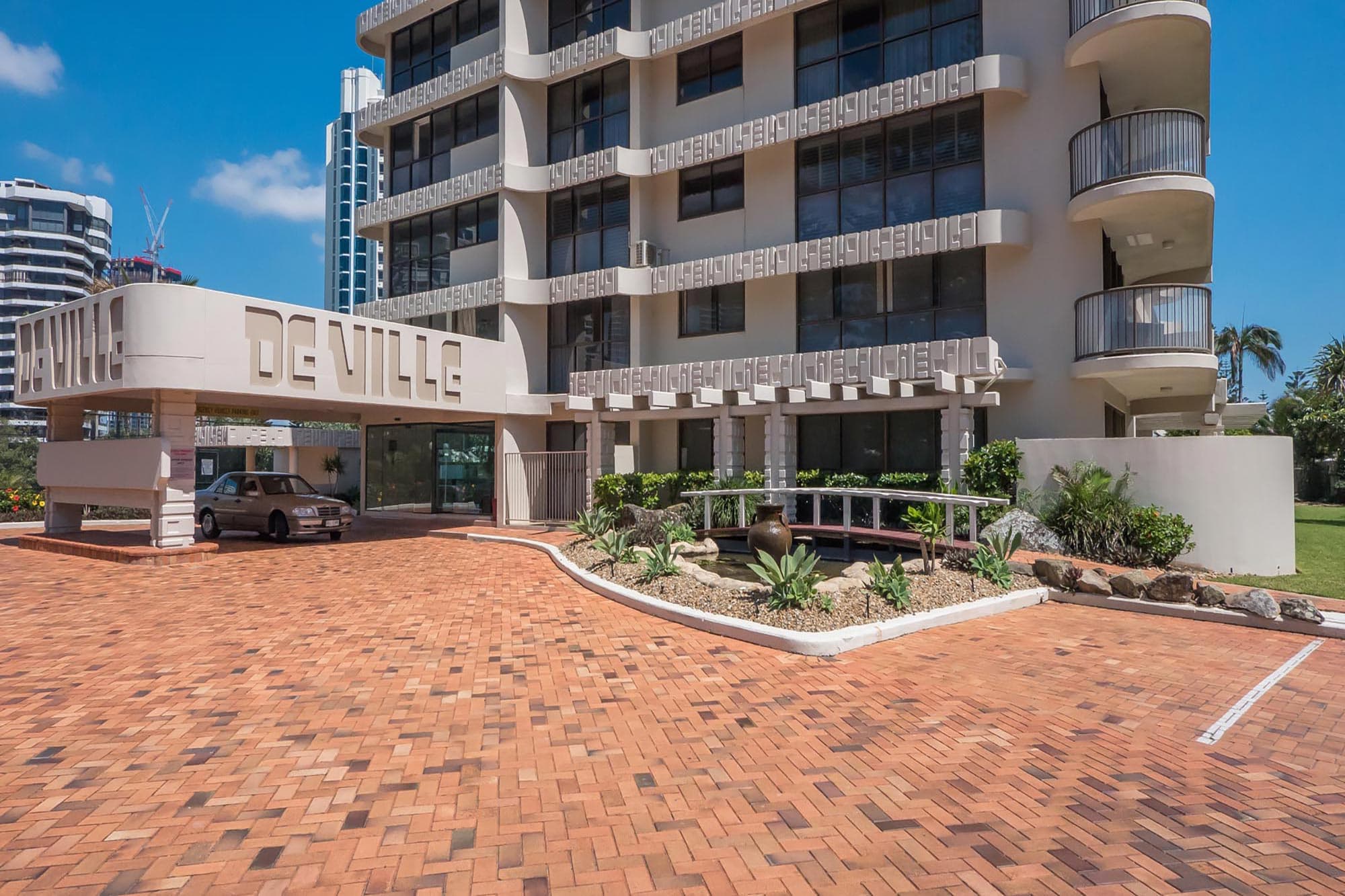 The DeVille Apartments entry, Main Beach