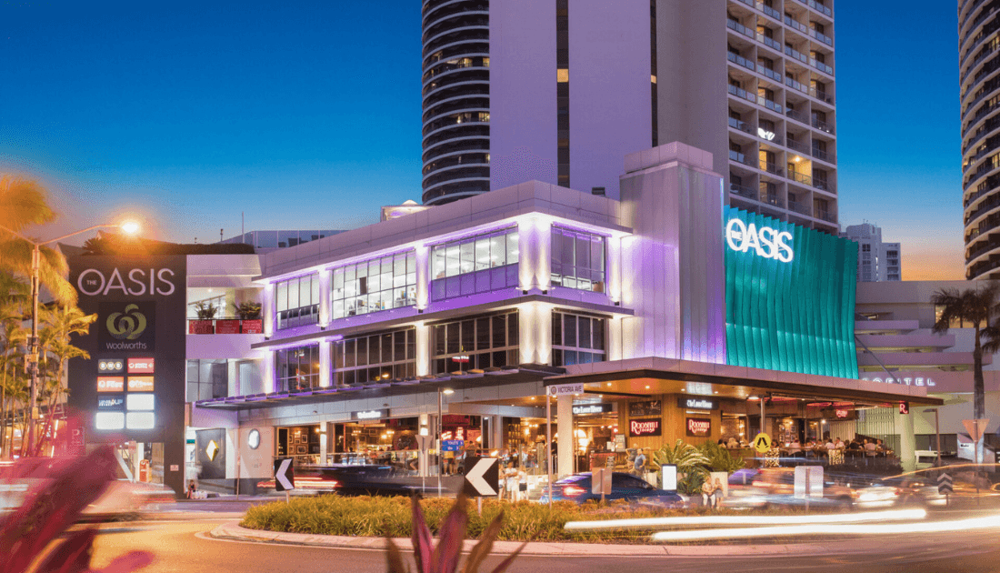 The Oasis shopping centre lit at night